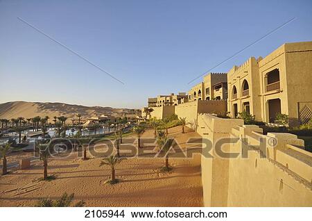 Picture - United Arab Emirates, Abu Dahbi, Qasr al Sarab, Main pool and dunes. Fotosearch