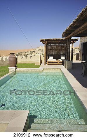 United Arab Emirates, Abu Dahbi, Qasr al Sarab, Poolside villa View Large Photo Image Stock Image - United Arab Emirates, Abu Dahbi, Qasr al Sarab, Poolside villa. Fotosearch
