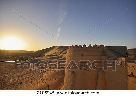 Stock Photography - United Arab Emirates, Abu Dahbi, Qasr al Sarab, Empty Quarter, Liwa desert at sunset. Fotosearch