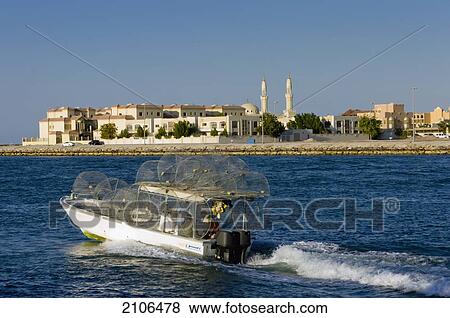 United Arab Emirates, Fishing boat leaving harbour; Ras Al Khaimah View Large Photo Image Stock Photo - United Arab Emirates, Fishing boat leaving harbour; Ras Al Khaimah. Fotosearch
