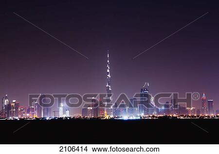 Picture - United Arab Emirates, Illuminated city skyline; Dubai. Fotosearch