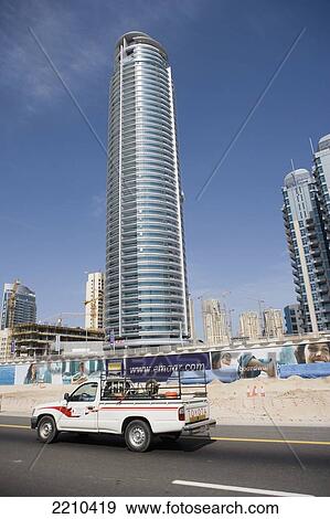United Arab Emirates, Posters Along Roadside Showing Aspirational Lifestyle Images; Dubai, New Building Development View Large Photo Image Stock Photo - United Arab Emirates, Posters Along Roadside Showing Aspirational Lifestyle Images; Dubai, New Building Development. Fotosearch