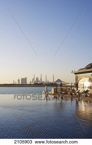 United Arab Emirates, Shangri-la Hotel; Abu Dhabi, View of Shaikh Zayed Bin Sultan Al Nahyan Mosque from infinity pool View Large Photo Image Stock Image - United Arab Emirates, Shangri-la Hotel; Abu Dhabi, View of Shaikh Zayed Bin Sultan Al Nahyan Mosque from infinity pool. Fotosearch