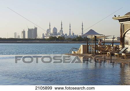 United Arab Emirates, Shangri-la Hotel; Abu Dhabi, View of Shaikh Zayed Bin Sultan Al Nahyan Mosque from infinity pool View Large Photo Image Stock Photo - United Arab Emirates, Shangri-la Hotel; Abu Dhabi, View of Shaikh Zayed Bin Sultan Al Nahyan Mosque from infinity pool. Fotosearch