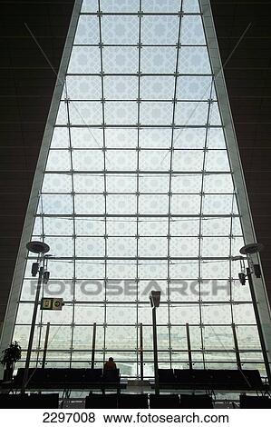 United Arab Emirates, Silhouette of man waiting in terminal of Dubai International Airport; Dubai View Large Photo Image Stock Photo - United Arab Emirates, Silhouette of man waiting in terminal of Dubai International Airport; Dubai. Fotosearch