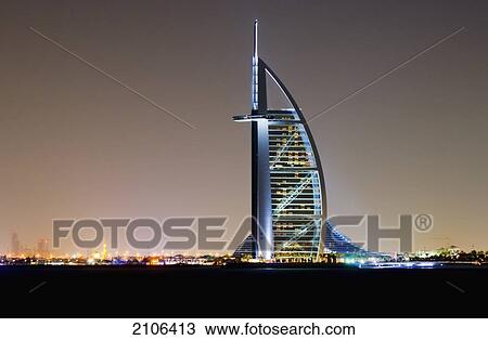 Stock Image - United Arab Emirates, View of Burj al Arab Hotel at dusk; Dubai. Fotosearch