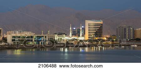 United Arab Emirates, View of city skyline at dusk; Ras Al Khaimah View Large Photo Image Stock Photo - United Arab Emirates, View of city skyline at dusk; Ras Al Khaimah. Fotosearch