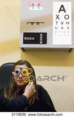 Stock Photography - United Kingdom, England, Child myopic optician; Esher. Fotosearch