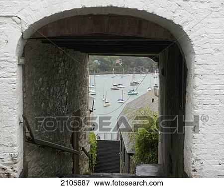 Stock Photo - United Kingdom, England, Cornwall, City gate overlooking harbor; Falmouth. Fotosearch