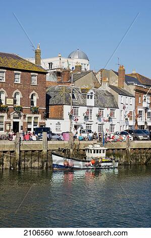 Stock Image - United Kingdom, England, Dorset, Old Harbour; Weymouth. Fotosearch