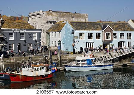 Stock Photo - United Kingdom, England, Dorset, Old Harbour waterfront; Weymouth. Fotosearch