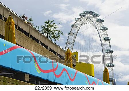 United Kingdom, England, London, London Eye visible from South bank Centre; South Bank View Large Photo Image Stock Photo - United Kingdom, England, London, London Eye visible from South bank Centre; South Bank. Fotosearch