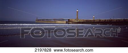 Stock Photo - United Kingdom, England, North Yorkshire, Whitby Pier; Whitby. Fotosearch