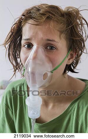 United Kingdom, England, Teenager with nebuliser; Esher View Large Photo Image Picture - United Kingdom, England, Teenager with nebuliser; Esher. Fotosearch