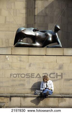 United Kingdom, England, West Yorkshire, Henry Moore Sculpture Outside Leeds Art Gallery And Woman Reading Book Beneath; Leeds View Large Photo Image Stock Image - United Kingdom, England, West Yorkshire, Henry Moore Sculpture Outside Leeds Art Gallery And Woman Reading Book Beneath; Leeds. Fotosearch