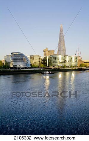 Stock Image - United Kingdom, More London; London, Skyline with view of City Hall and Shard building. Fotosearch