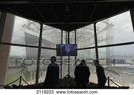 Stock Image - United Kingdom, Northern Ireland, Visitors at Titanic Exhibition Centre; Belfast. Fotosearch