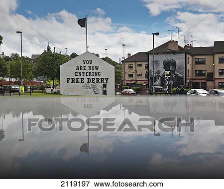 United Kingdom, Northern Ireland, County Londonderry, Reflected view of murals in Bogside Area; Derry View Large Photo Image Stock Photo - United Kingdom, Northern Ireland, County Londonderry, Reflected view of murals in Bogside Area; Derry. Fotosearch