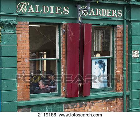 Stock Photograph - United Kingdom, Northern Ireland, County Londonderry, Hair salon Baldies Barbers; Derry. Fotosearch