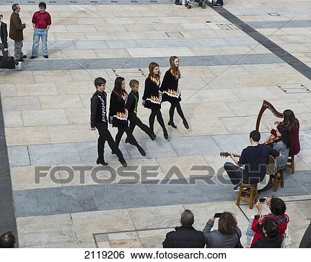 United Kingdom, Northern Ireland, County Londonderry, Irish dancers and musicians playing at Guildhall Square; Derry View Large Photo Image Stock Photograph - United Kingdom, Northern Ireland, County Londonderry, Irish dancers and musicians playing at Guildhall Square; Derry. Fotosearch
