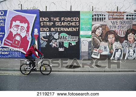 Stock Photo - United Kingdom, Northern Ireland, Wall murals in Falls Road; Belfast. Fotosearch