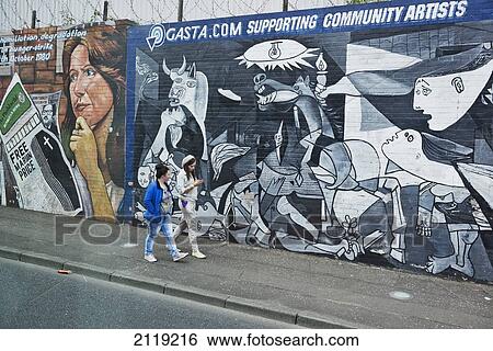 Stock Photograph - United Kingdom, Northern Ireland, Wall murals in Falls Road; Belfast. Fotosearch