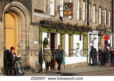 Stock Photo - United Kingdom, Scotland, City street on Royal mile; Edinburgh. Fotosearch