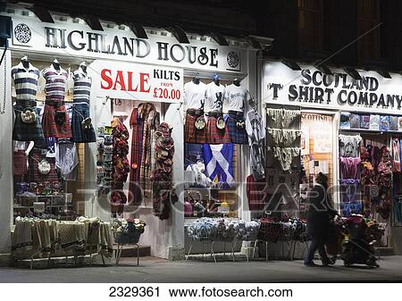 Stock Image - United Kingdom, Scotland, Illuminated window display on Royal Mile; Edinburgh. Fotosearch