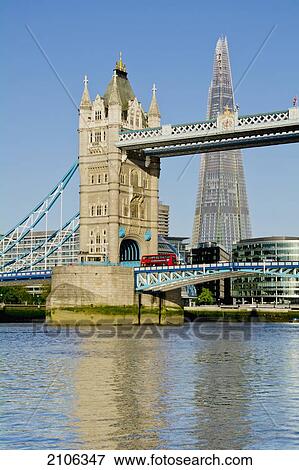 Stock Photo - United Kingdom, Shard building in background; London, View of Tower Bridge. Fotosearch