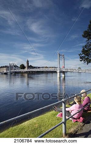 United Kingdom, Two senior woman sitting next to river; Scotland View Large Photo Image Picture - United Kingdom, Two senior woman sitting next to river; Scotland. Fotosearch