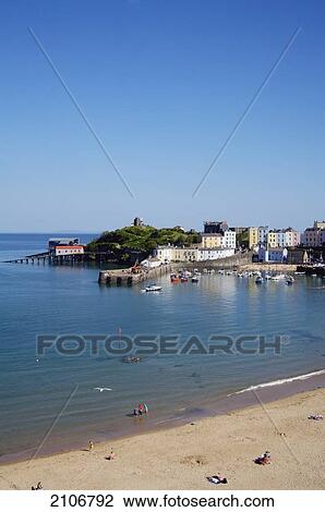 Stock Image - United Kingdom, View of beach and town; Wales. Fotosearch