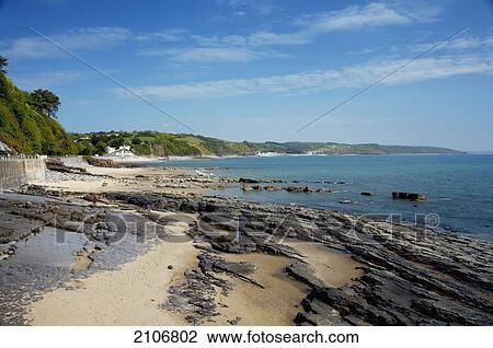 Stock Image - United Kingdom, View of sea and beach; Wales. Fotosearch