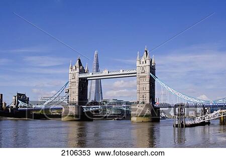 Stock Image - United Kingdom, View of Tower Bridge and Sahrd building; London. Fotosearch