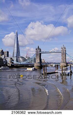 Stock Image - United Kingdom, View of Tower Bridge and Sahrd building; London. Fotosearch
