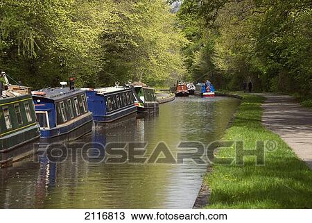 Stock Image - United Kingdom, Wales, Llangollen Canal, Narrow Boats on the Canal. Fotosearch