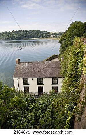 Stock Photography - United Kingdom, Wales, Pembrokeshire, Dylan Thomas Boathouse; Laugharne. Fotosearch