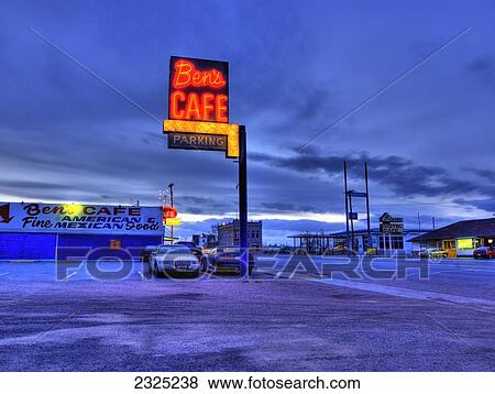 Stock Photo - United States of America, Neon sign and parking for Ben's Cafe; Utah. Fotosearch