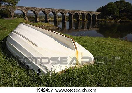 Stock Photo - Upturned Boat On The Grass; Ballydehob County Cork Ireland. Fotosearch