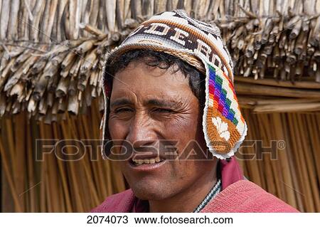 Stock Image - Urus Iruitos Man, Titicaca Lake, Bolivia. Fotosearch