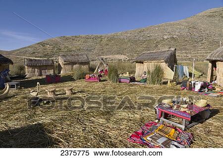 Urus Iruitos people on Chisawa, a reed island made by the Urus Iruitos people in Titicaca Lake, Bolivia View Large Photo Image Stock Photography - Urus Iruitos people on Chisawa, a reed island made by the Urus Iruitos people in Titicaca Lake, Bolivia. Fotosearch