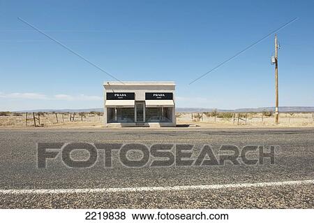 Stock Photo - USA, Abandoned building near country road; Texas. Fotosearch
