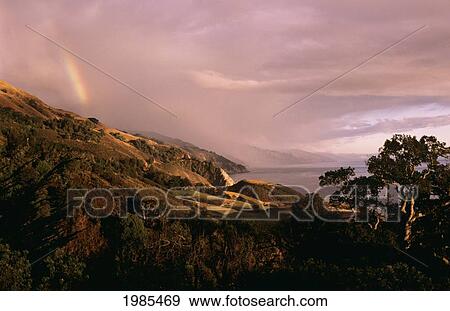 USA, California, Coastline landscape with rainbow at sunset; Big Sur View Large Photo Image Stock Photo - USA, California, Coastline landscape with rainbow at sunset; Big Sur. Fotosearch