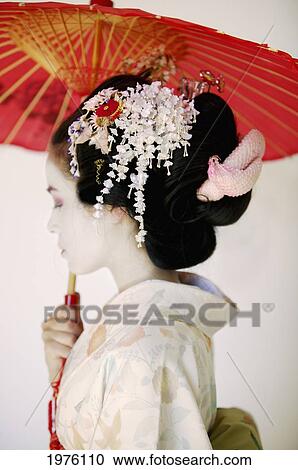 USA, California, Profile Portrait Of Maiko Holding Umbrella; Santa Barbara View Large Photo Image Stock Image - USA, California, Profile Portrait Of Maiko Holding Umbrella; Santa Barbara. Fotosearch