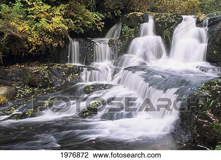 Stock Image - USA, Coast Range Mountains; Oregon, Alsea Falls Cascading Through Forest. Fotosearch
