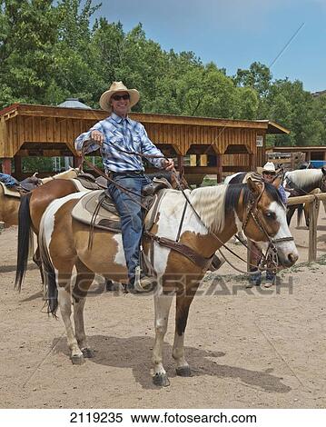 USA, Colorado, Big Thompson River Valley; Loveland, Horseback riding at Sylvan Dale Ranch View Large Photo Image Stock Photography - USA, Colorado, Big Thompson River Valley; Loveland, Horseback riding at Sylvan Dale Ranch. Fotosearch