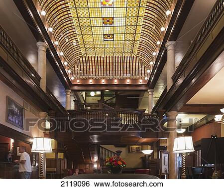 Stock Photograph - USA, Colorado, Boulder, Stained glass lobby of oldest operating hotel in Boulder and nationally registered landmark; Hotel Boulderado. Fotosearch