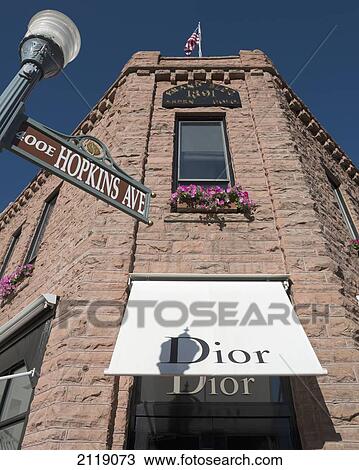 Stock Image - USA, Colorado, Downtown shopping district; Aspen, Dior store on corner of Galena St and Hopkins Ave. Fotosearch
