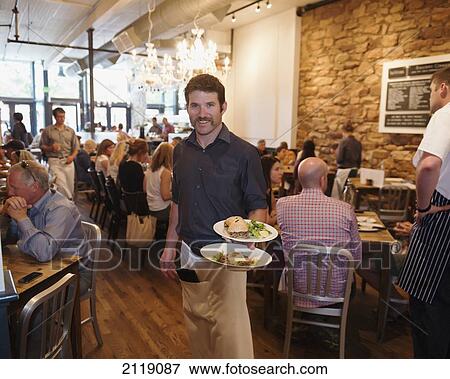 USA, Colorado, Lunchtime waiter service at Kitchen restaurant; Boulder View Large Photo Image Stock Photo - USA, Colorado, Lunchtime waiter service at Kitchen restaurant; Boulder. Fotosearch