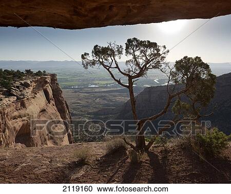Stock Image - USA, Colorado, Magnificent views of sheer rock canyons and red sandstone monoliths; Colorado National Monument. Fotosearch