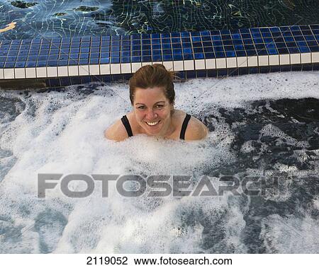USA, Colorado, Woman in hot tub at hotel Jerome; Aspen View Large Photo Image Stock Image - USA, Colorado, Woman in hot tub at hotel Jerome; Aspen. Fotosearch